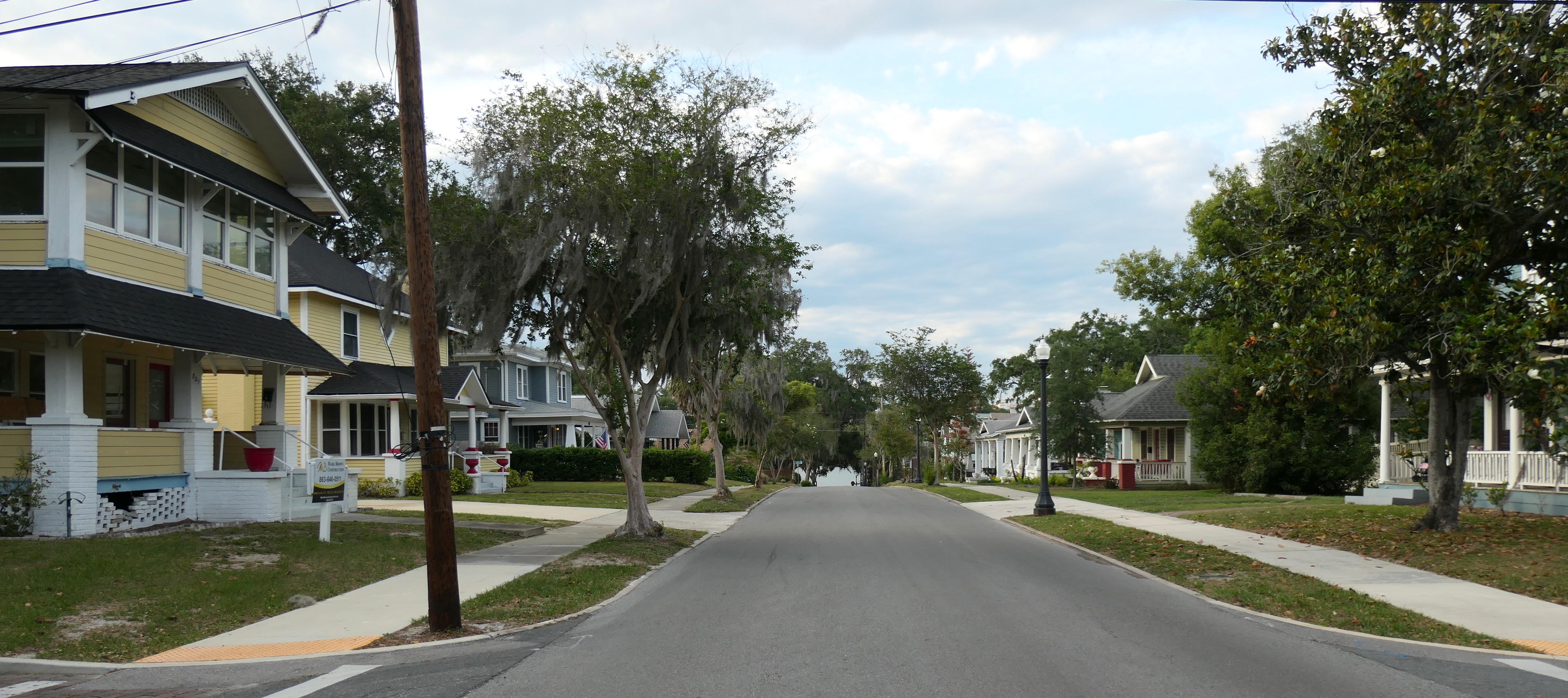 A tree-lined residential street in Lakeland, Florida